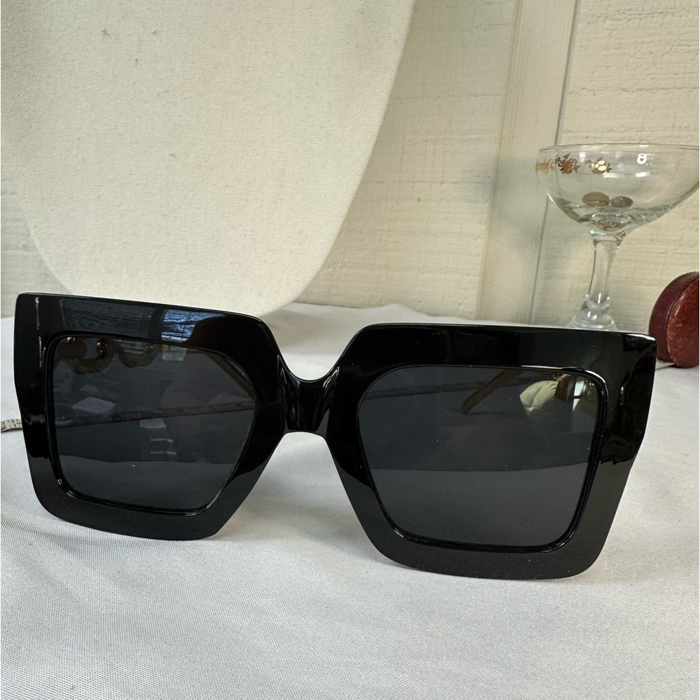 Large square chunky black and goldtone fashion sunglasses